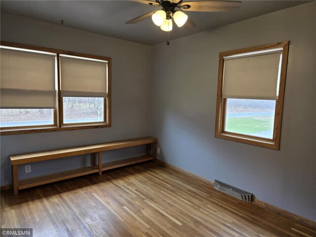 439 270th Ave, Cumberland, WI 54829 - spare room featuring ceiling fan, visible vents, and light wood finished floors