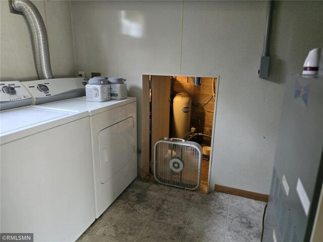 439 270th Ave, Cumberland, WI 54829 - clothes washing area with baseboards, laundry area, and washer and dryer