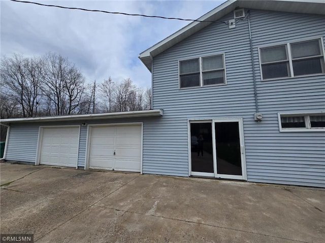 439 270th Ave, Cumberland, WI 54829 - back of property featuring a garage