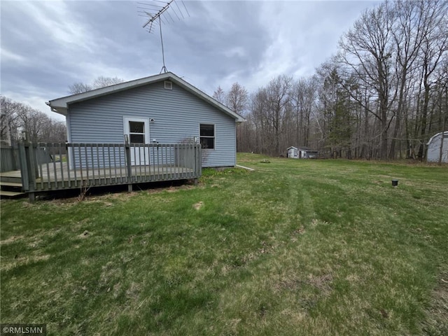439 270th Ave, Cumberland, WI 54829 - rear view of property featuring a yard and a deck