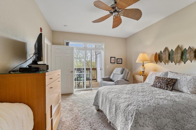 bedroom featuring carpet flooring, a ceiling fan, and access to exterior
