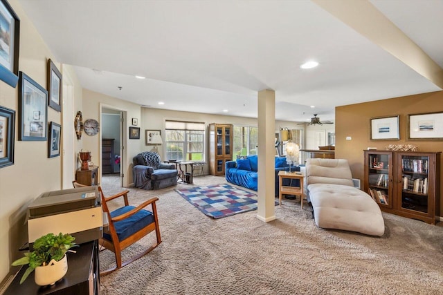 living area with carpet flooring, recessed lighting, and a ceiling fan