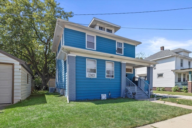 2311 20th St, Racine, WI 53403 - american foursquare style home with central air condition unit, covered porch, and a front lawn