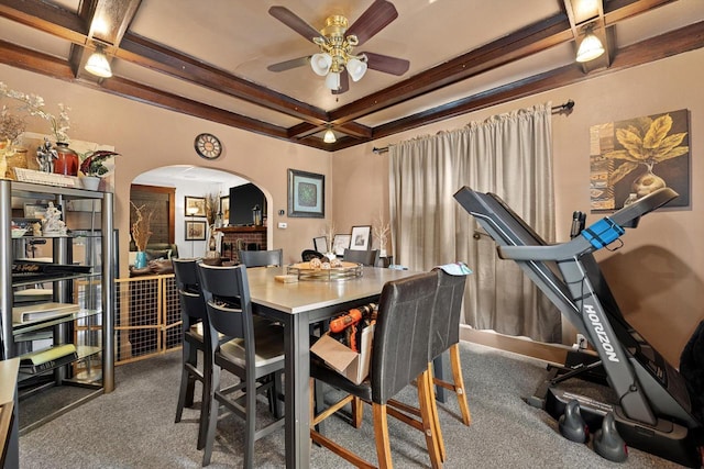 2311 20th St, Racine, WI 53403 - dining space with ceiling fan, arched walkways, beam ceiling, carpet floors, and coffered ceiling