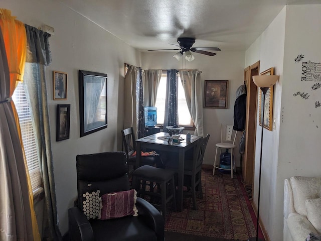 dining space with ceiling fan