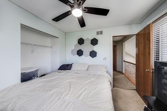 bedroom featuring carpet floors, ceiling fan, and visible vents