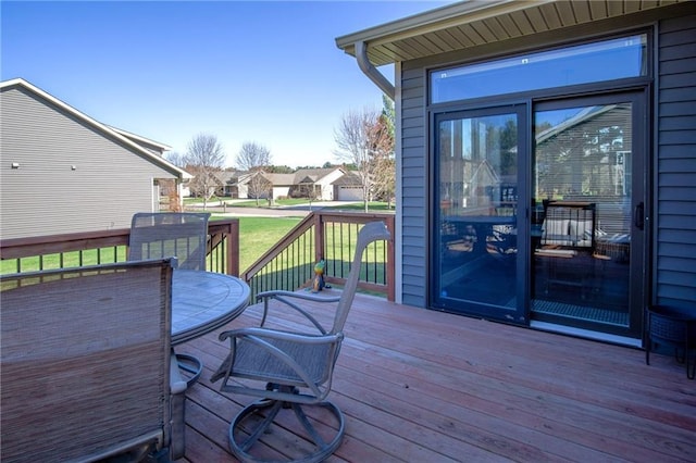 2931 Drier Rd, Eau Claire, WI 54701 - wooden terrace with a lawn, a residential view, and outdoor dining space