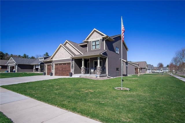 2931 Drier Rd, Eau Claire, WI 54701 - craftsman-style home featuring a garage, a porch, driveway, and a front yard