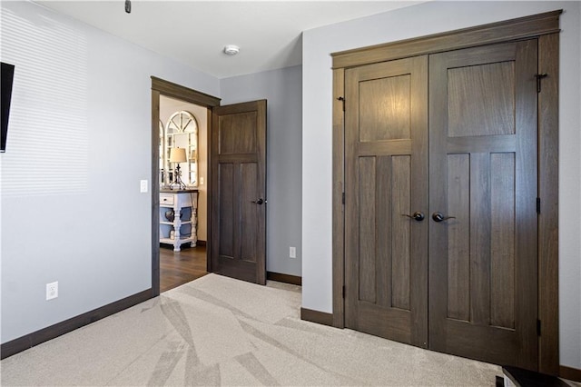 2931 Drier Rd, Eau Claire, WI 54701 - bedroom featuring baseboards, carpet, and a closet