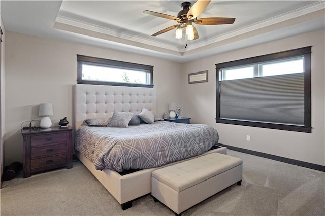 2931 Drier Rd, Eau Claire, WI 54701 - bedroom featuring crown molding, a ceiling fan, carpet flooring, and a tray ceiling