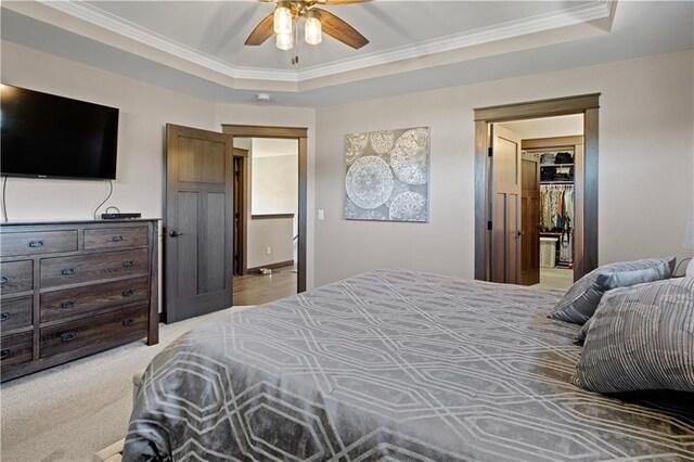 2931 Drier Rd, Eau Claire, WI 54701 - bedroom featuring crown molding, a ceiling fan, and a raised ceiling