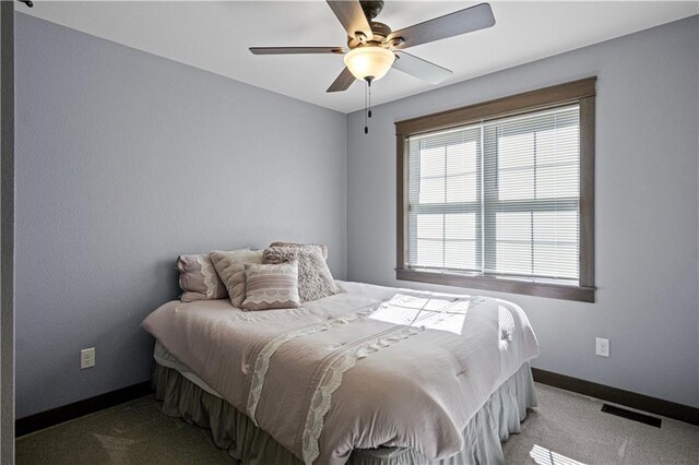 2931 Drier Rd, Eau Claire, WI 54701 - carpeted bedroom with visible vents, a ceiling fan, and baseboards