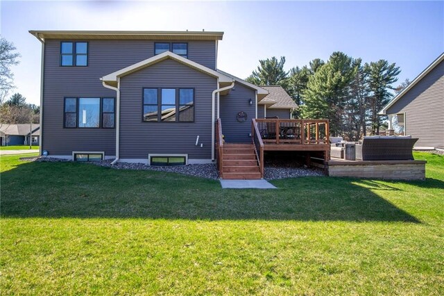 2931 Drier Rd, Eau Claire, WI 54701 - rear view of property featuring a lawn and a deck
