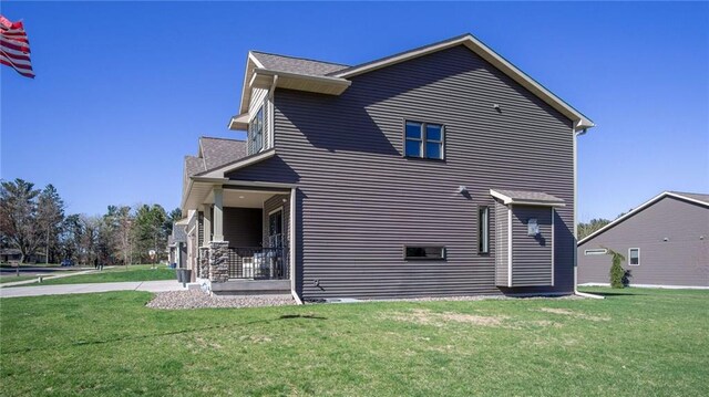 2931 Drier Rd, Eau Claire, WI 54701 - rear view of property with a lawn