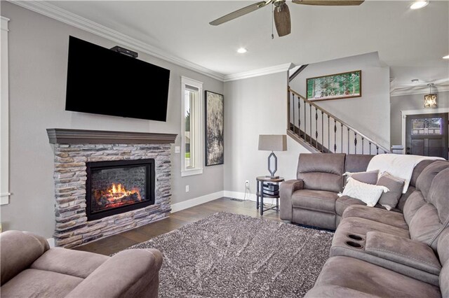 2931 Drier Rd, Eau Claire, WI 54701 - living room with crown molding, stairs, wood finished floors, baseboards, and a ceiling fan
