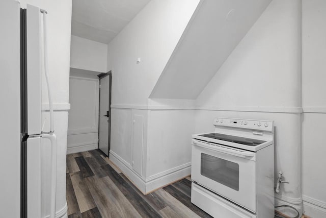 kitchen with white appliances and wood finished floors