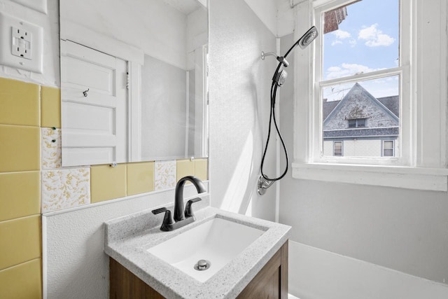 bathroom featuring vanity and walk in shower