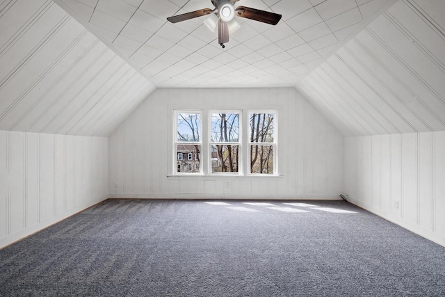 bonus room with carpet, a ceiling fan, and lofted ceiling
