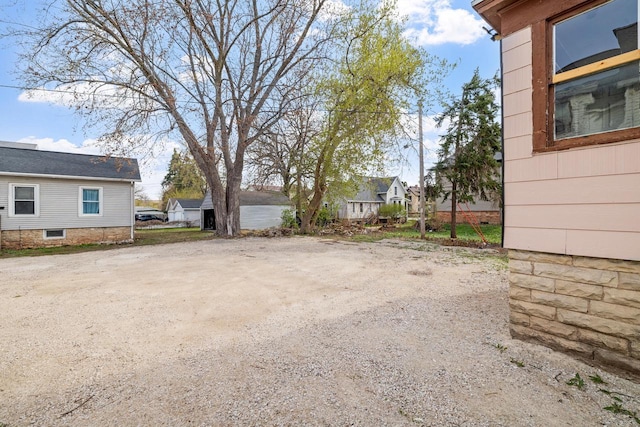 view of yard with a residential view