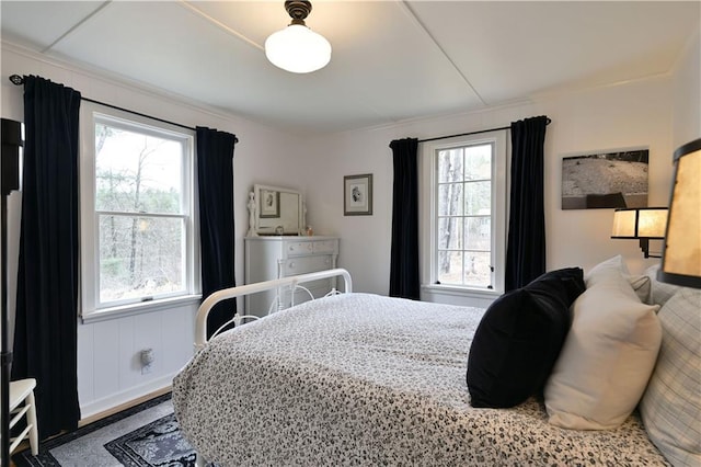 13195 Kavanaugh Rd, Cable, WI 54821 - bedroom featuring multiple windows and ornamental molding