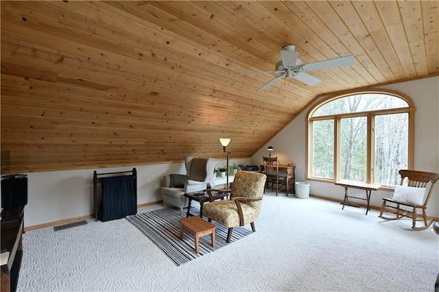 13195 Kavanaugh Rd, Cable, WI 54821 - living area featuring ceiling fan, vaulted ceiling, wooden ceiling, carpet floors, and baseboards