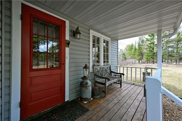 13195 Kavanaugh Rd, Cable, WI 54821 - wooden deck with a porch