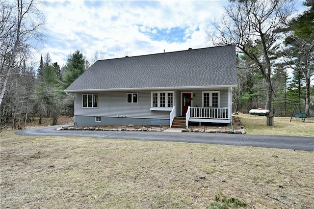 13195 Kavanaugh Rd, Cable, WI 54821 - rear view of house featuring covered porch, a yard, and a shingled roof