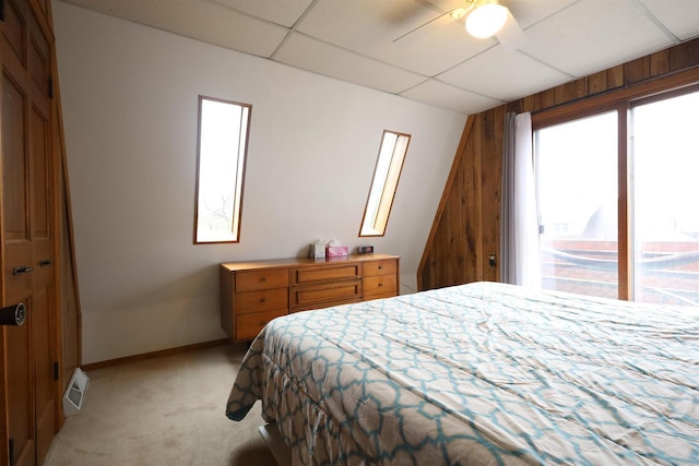 147 N James St, Kimberly, WI 54136 - bedroom with a ceiling fan, visible vents, a paneled ceiling, baseboards, and light carpet