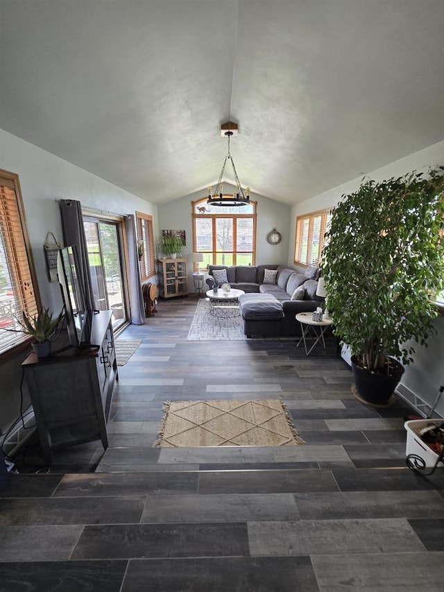 W6517 Greenwood Ct, Greenville, WI 54952 - living room featuring vaulted ceiling, wood finished floors, and healthy amount of natural light