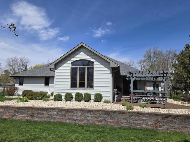 W6517 Greenwood Ct, Greenville, WI 54952 - rear view of house with a pergola and roof with shingles