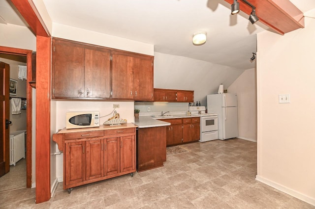 kitchen with radiator, white appliances, light countertops, brown cabinets, and a sink
