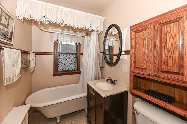 full bath featuring toilet, a soaking tub, and vanity
