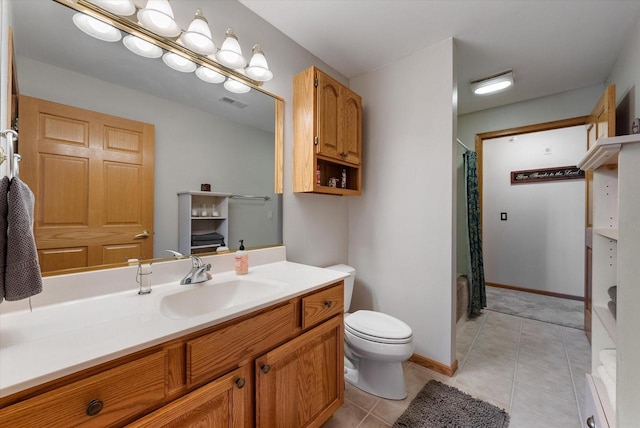 bathroom with visible vents, vanity, tile patterned floors, toilet, and a shower with shower curtain