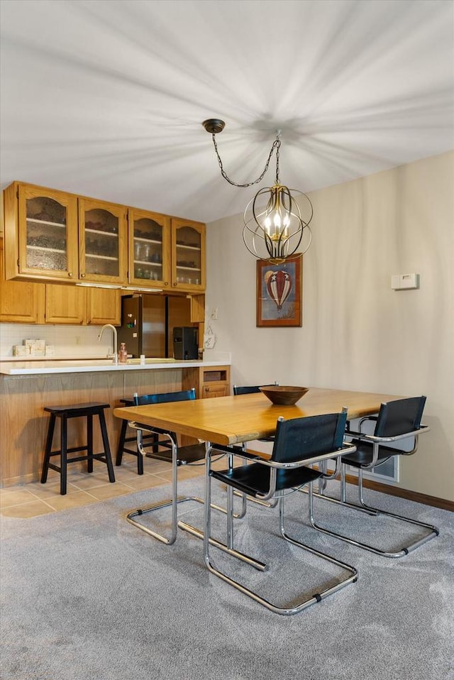 dining area with light tile patterned flooring