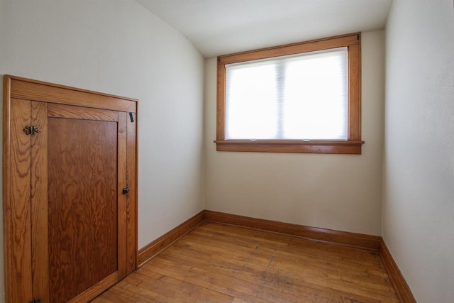 5016 Sth 96, Denmark, WI 54208 - unfurnished room with baseboards and light wood-style flooring