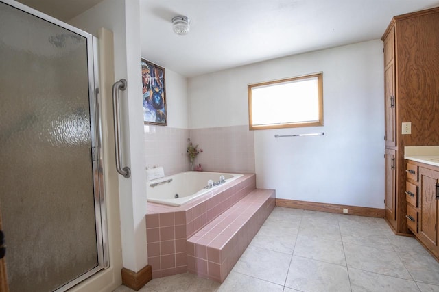 5016 Sth 96, Denmark, WI 54208 - bathroom with vanity, a garden tub, tile patterned flooring, baseboards, and a stall shower