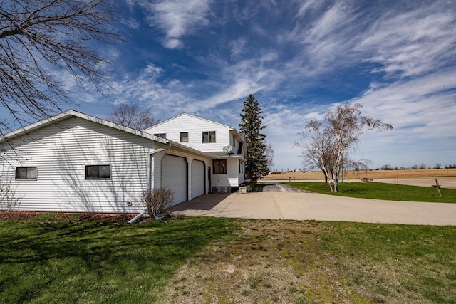 5016 Sth 96, Denmark, WI 54208 - view of home's exterior featuring a yard, an attached garage, and driveway