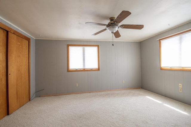 5016 Sth 96, Denmark, WI 54208 - unfurnished bedroom featuring multiple windows, carpet flooring, and ceiling fan