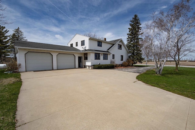5016 Sth 96, Denmark, WI 54208 - view of front of house with an attached garage, concrete driveway, a front lawn, and a chimney