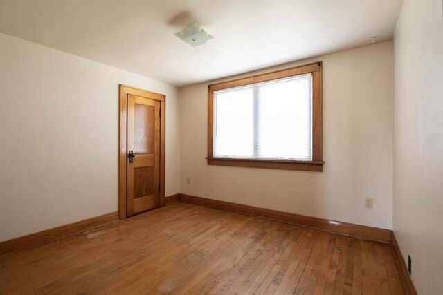 5016 Sth 96, Denmark, WI 54208 - empty room with light wood-style floors and baseboards