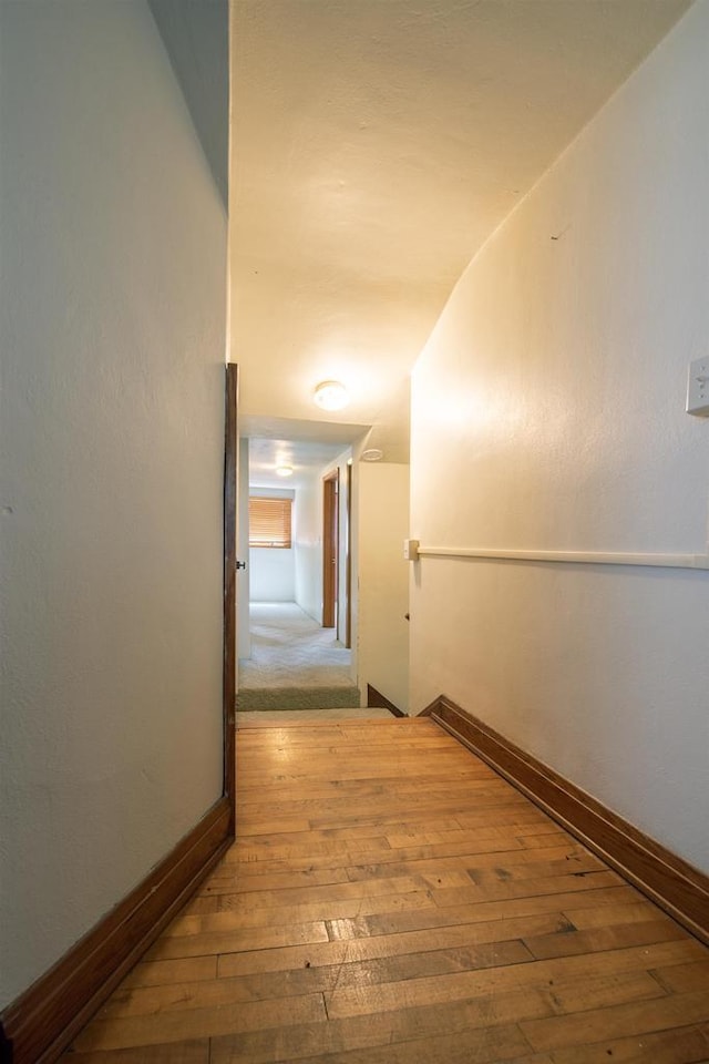 5016 Sth 96, Denmark, WI 54208 - hall featuring baseboards, vaulted ceiling, and hardwood / wood-style flooring