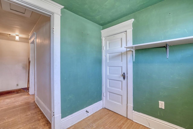 611 N St, West Bend, WI 53090 - unfurnished room featuring wood finished floors and baseboards