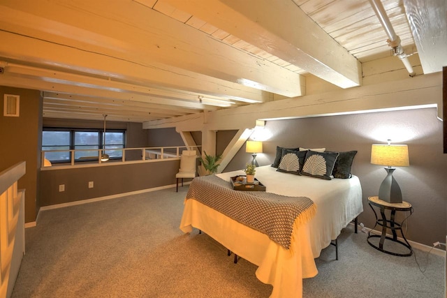 carpeted bedroom featuring baseboards