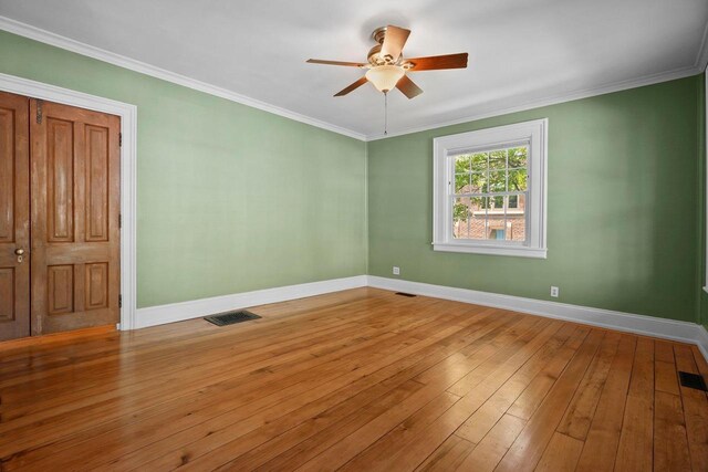 126 S Hancock St, Madison, WI 53703 - empty room featuring baseboards, a ceiling fan, light wood-style flooring, and crown molding
