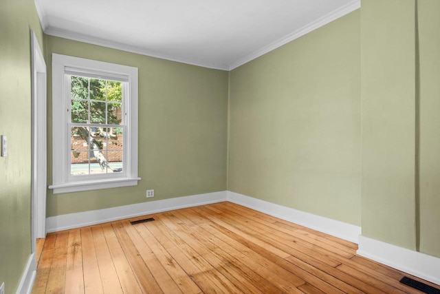 126 S Hancock St, Madison, WI 53703 - unfurnished room with wood-type flooring, baseboards, and ornamental molding