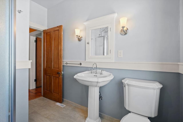 126 S Hancock St, Madison, WI 53703 - half bathroom featuring toilet