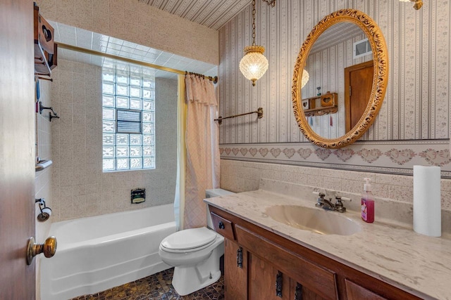 bathroom featuring vanity, shower / bathtub combination with curtain, toilet, and wallpapered walls