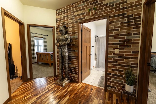 351 Alyssa St, Tomah, WI 54660 - corridor featuring hardwood / wood-style floors