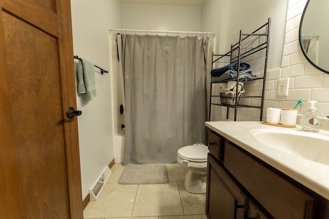 351 Alyssa St, Tomah, WI 54660 - bathroom featuring vanity, toilet, tile patterned floors, tasteful backsplash, and visible vents
