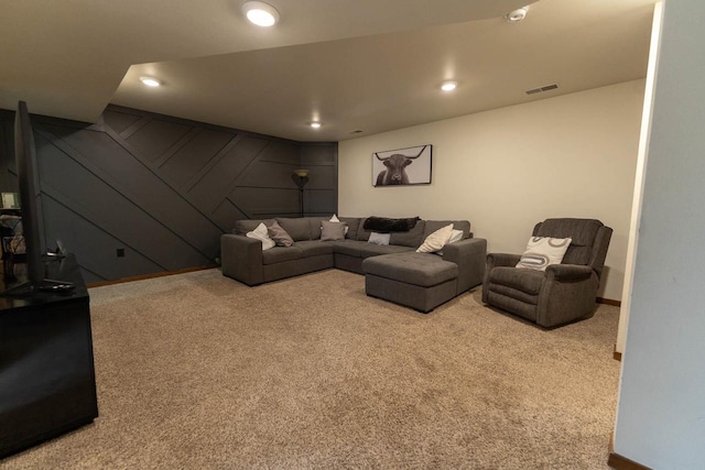 351 Alyssa St, Tomah, WI 54660 - carpeted living area featuring a decorative wall, recessed lighting, and visible vents